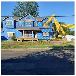 Two Story House Painted In Blue